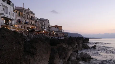 Sunset Over Seafront Restaurant In Mediterranean Sea Video stock 76722512