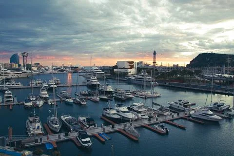 Sunset over a seaport Stock Photos