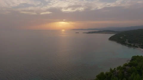 Sunset over serene sea Stock Footage 263930336