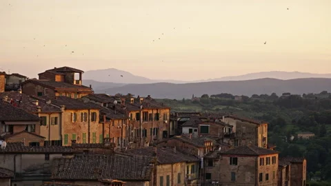 Sunset Over Siena’s Rooftops with Birds and Ambient Sound – Tuscany, Italy Stock Footage 247398528