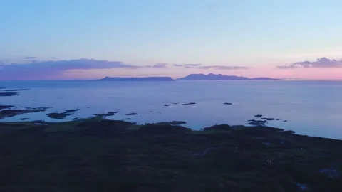 Sunset over Silversands Beaches and Silver Sands of Morar from a drone, Scotland 動画素材 199231799