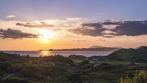 Sunset over Silversands Beaches and Silver Sands of Morar in timelapse, Scotland 動画素材 232128538