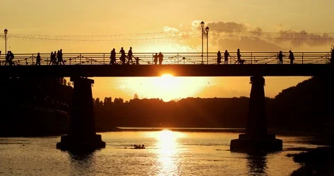Sunset Over Small City River With Pedestrian Bridge, Transition From Day to Stock Footage 89303614