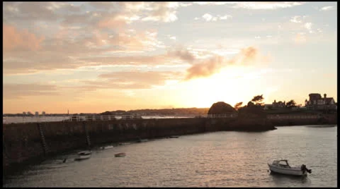 Sunset over small harbor Stock Footage 23929619