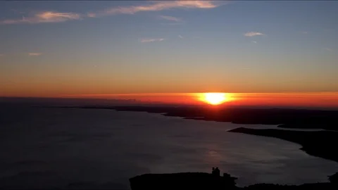 Sunset over small islands and sea Stock Footage 100127430