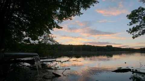Sunset over small lake timelapse Stock Footage 72848346