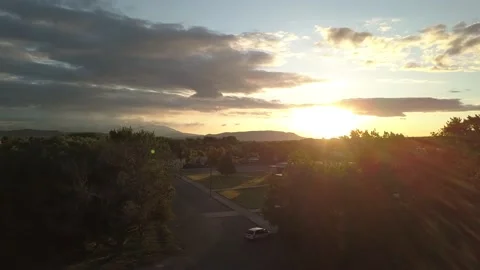 Sunset over small town vertical rise Stock Footage 166330668