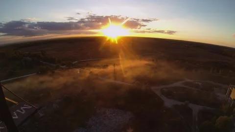 Sunset over a smoky field Stock Footage 196242252