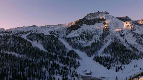Sunset over the snow-capped Dolomites in the Italian Alps Stock Footage 233933884