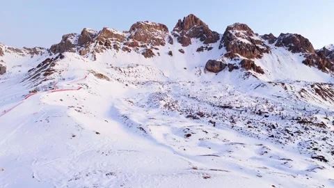 Sunset over the snow-capped Dolomites in the Italian Alps Stock Footage 233938851