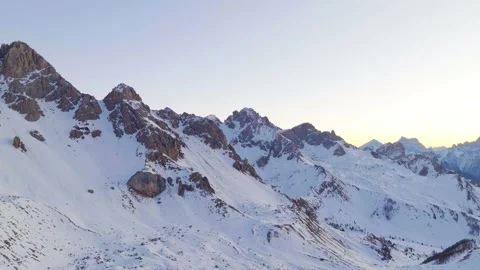 Sunset over the snow-capped Dolomites in the Italian Alps Stock Footage 233939094