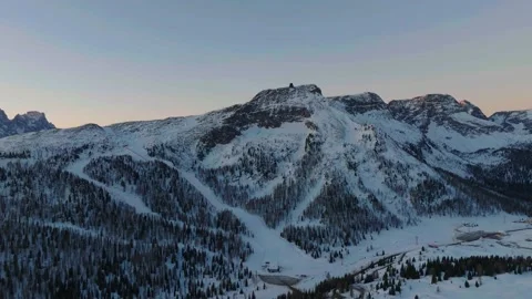 Sunset over the snow-capped Dolomites in the Italian Alps Stock Footage 233975678
