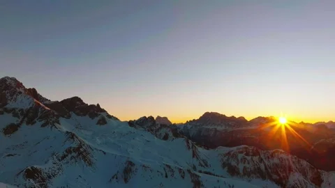 Sunset over the snow-capped Dolomites in the Italian Alps Stock Footage 233976506