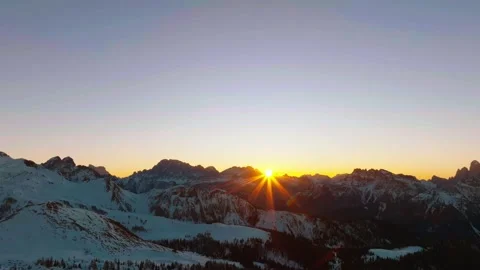 Sunset over the snow-capped Dolomites in the Italian Alps Stock Footage 233976638