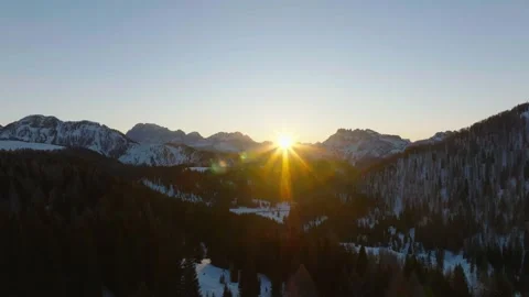 Sunset over the snow-capped Dolomites in the Italian Alps Stock Footage 233977356