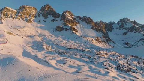 Sunset over the snow-capped Dolomites in the Italian Alps Stock Footage 233977964
