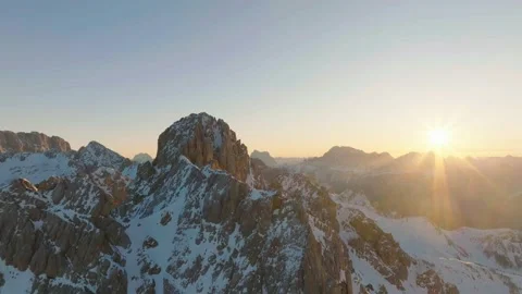 Sunset over the snow-capped Dolomites in the Italian Alps Stock Footage 233979452