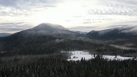 SUNSET OVER SNOWY MOUNTAINS Stock Footage 98965878