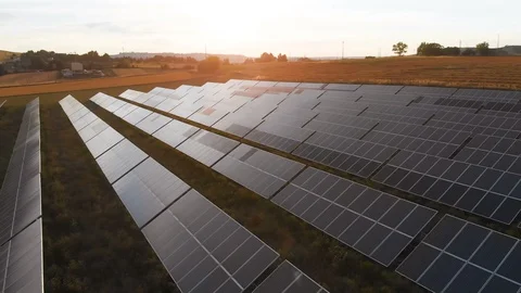 Sunset over solar panels field Green Renewable Energy aerial view ,Italy Stock Footage 91792070