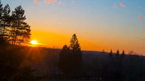 Sunset over the spring forest, time-lapse Stock Footage 127973070