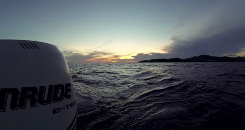 Sunset over the stern of a boat Stock Footage 42859868