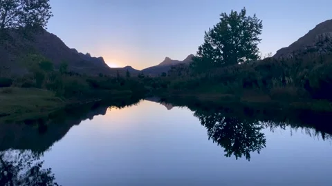 Sunset over a still river in the Cederberg, South Africa Stock Footage 181467197
