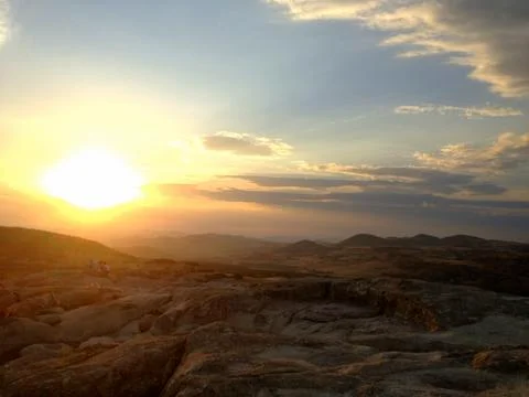 Sunset over stone mountain. Stock Photos