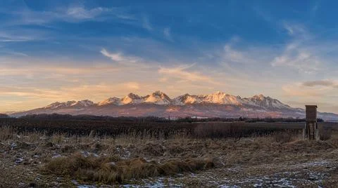 Sunset over the sub-Tatra town of Svit with a hunting possession 스톡 사진