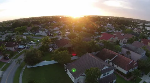Sunset over suburban homes in Florida Stock Footage 44485030
