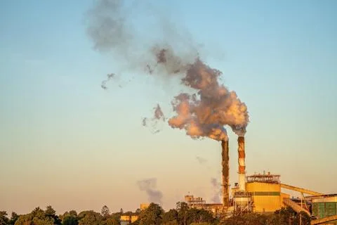 Sunset Over A Sugar Mill Refinery During Crushing Season Stock Photos