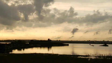 Sunset over sunken ships pan Stock Footage 180251