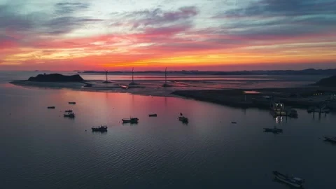 Sunset over Tando Port wind turbines and Nue Island sea road in Ansan South 動画素材 334411288