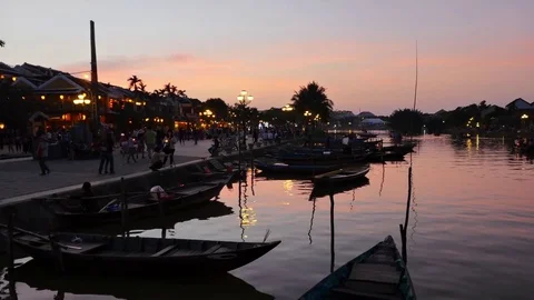 Sunset over Thu Bon River, Old Quarter of Hoi An, Vietnam in 4k Stock Footage 76141312