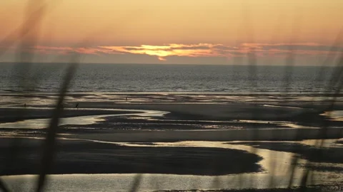 Sunset over tidal beach on Opal Coast, France Video stock 332109170