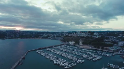 Sunset over Torquay Marina from a drone, English Riviera, Torbay, Devon, England 動画素材 202868047