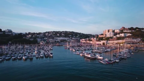 Sunset over Torquay Marina from a drone, English Riviera, Torbay, Devon, England 動画素材 205768552
