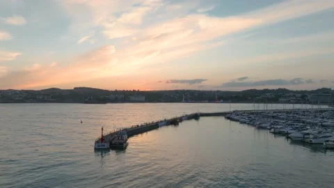 Sunset over Torquay Marina from a drone, English Riviera, Torbay, Devon, England 動画素材 205887643