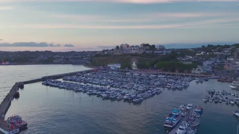 Sunset over Torquay Marina from a drone, English Riviera, Torbay, Devon, England 動画素材 205892453