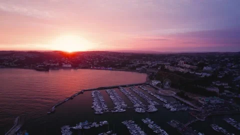 Sunset over Torquay Marina from a drone, English Riviera, Torbay, Devon, England 動画素材 207404010
