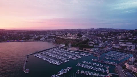 Sunset over Torquay Marina from a drone, English Riviera, Torbay, Devon, England 動画素材 207405237