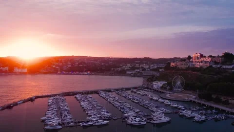 Sunset over Torquay Marina from a drone, English Riviera, Torbay, Devon, England 動画素材 207460434