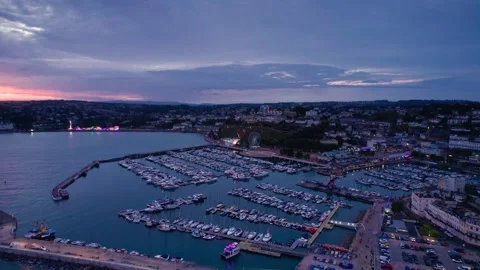 Sunset over Torquay Marina from a drone, English Riviera, Torbay, Devon, England 動画素材 207487250