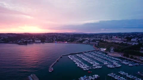 Sunset over Torquay Marina from a drone, English Riviera, Torbay, Devon, England 動画素材 207558253