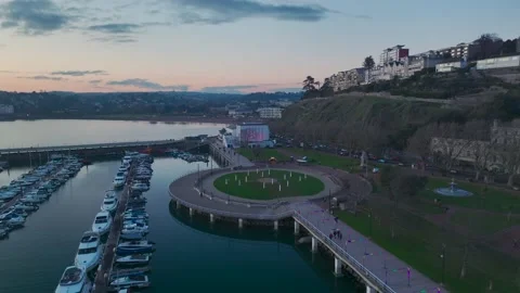 Sunset over Torquay Marina from a drone, English Riviera, Torbay, Devon, England 動画素材 229557652