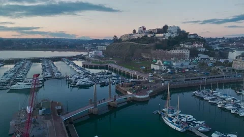 Sunset over Torquay Marina from a drone, English Riviera, Torbay, Devon, England 動画素材 229557910