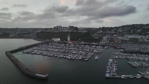 Sunset over Torquay Marina from a drone, English Riviera, Torbay, Devon, England 動画素材 254866232