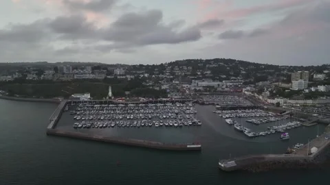 Sunset over Torquay Marina from a drone, English Riviera, Torbay, Devon, England 動画素材 254866427