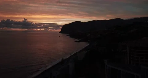 Sunset over town in Madeira with abandoned building Clip 9 Stock Footage