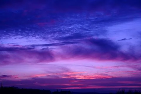 Sunset over the town Stock Photos