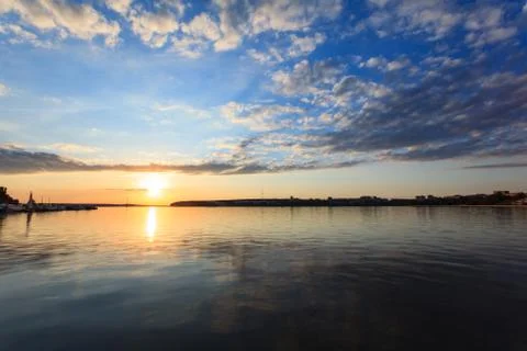 Sunset over the town pond Stock Photos
